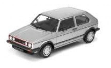 Silver diecast model car 1:18 scale, classic hatchback design, detailed exterior