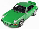 Green Porsche Carrera diecast model car in 1:18 scale with black accents and rear wing