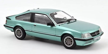1:18 scale diecast model car in metallic green, classic coupe with realistic details