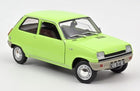 Green 1:18 scale diecast model car with classic compact design and French license plate