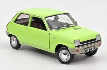 1:18 scale diecast model car in light green with detailed wheels and classic compact design