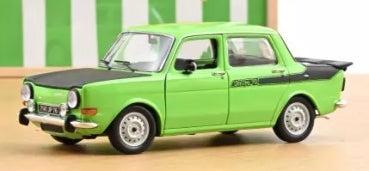 Green diecast model car 1:18 scale with black hood and rear spoiler on display