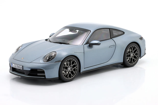 https://automodele.eu/environment/cache/images/productGfx_760939_0_0/187170-Porsche-911-992-Carrera-2025---964-Polar-Silver-Metallic-Norev-118.webp