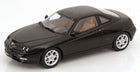 1:18 scale black diecast model car coupe with silver wheels and tan interior