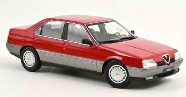 Red and silver diecast model car, four-door sedan, 1:18 scale, detailed wheels and trim