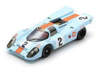 1:18 scale diecast Porsche 917 Gulf racing car in light blue with orange stripes and number 2