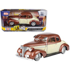https://cdn.shopify.com/s/files/1/0504/9925/6496/files/1939-chevrolet-coupe-lowrider-beige-and-brown-metallic-get-low-series-124-diecast-model-car-by-motormax-484411.jpg?v=1748418016