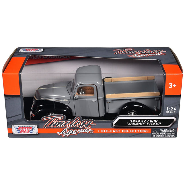 https://cdn.shopify.com/s/files/1/0504/9925/6496/files/1942-47-ford-jailbar-pickup-truck-gray-and-black-timeless-legends-series-124-diecast-model-car-by-motormax-431895.jpg?v=1748405265