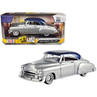 https://cdn.shopify.com/s/files/1/0504/9925/6496/files/1950-chevrolet-bel-air-lowrider-silver-metallic-with-blue-metallic-top-get-low-series-124-diecast-model-car-by-motormax-427233.jpg?v=1748418017