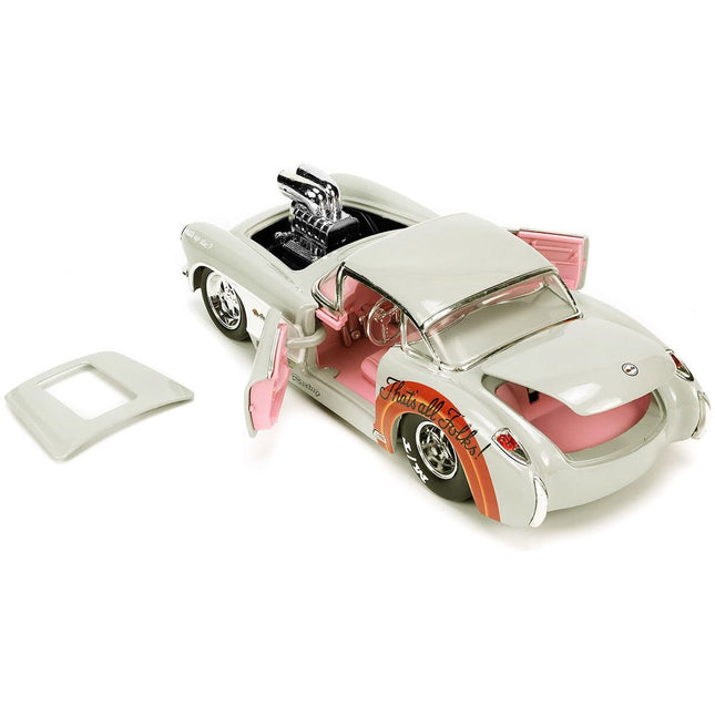 https://cdn.shopify.com/s/files/1/0504/9925/6496/files/1957-chevrolet-corvette-beige-with-pink-interior-with-bugs-bunny-figure-looney-tunes-hollywood-rides-series-124-diecast-model-car-by-jada-851114.jpg?v=1748419131