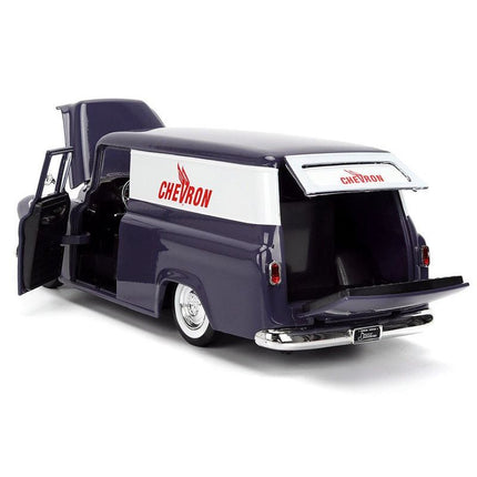 https://cdn.shopify.com/s/files/1/0504/9925/6496/files/1957-chevrolet-suburban-chevron-dark-blue-with-white-stripes-and-chevron-gas-pump-just-trucks-series-124-diecast-model-car-by-jada-164088.jpg?v=1756087061