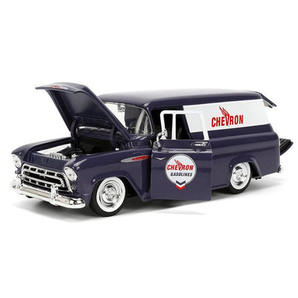 https://cdn.shopify.com/s/files/1/0504/9925/6496/files/1957-chevrolet-suburban-chevron-dark-blue-with-white-stripes-and-chevron-gas-pump-just-trucks-series-124-diecast-model-car-by-jada-396048.jpg?v=1756087063