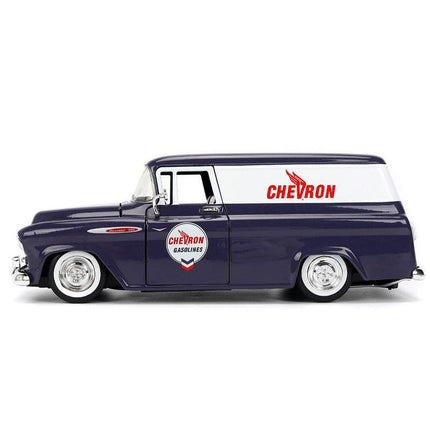 https://cdn.shopify.com/s/files/1/0504/9925/6496/files/1957-chevrolet-suburban-chevron-dark-blue-with-white-stripes-and-chevron-gas-pump-just-trucks-series-124-diecast-model-car-by-jada-441426.jpg?v=1756087062