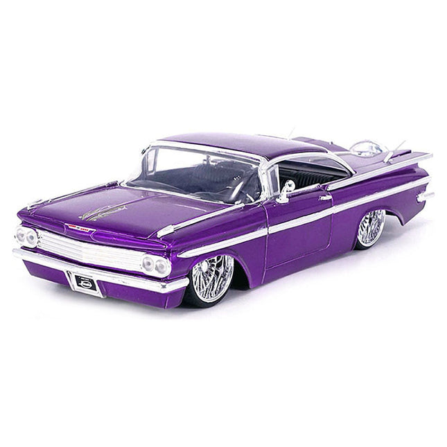 https://cdn.shopify.com/s/files/1/0504/9925/6496/files/1959-chevrolet-impala-lowrider-candy-purple-with-dub-wire-wheels-street-low-series-124-diecast-model-car-by-jada-793297.jpg?v=1748405262