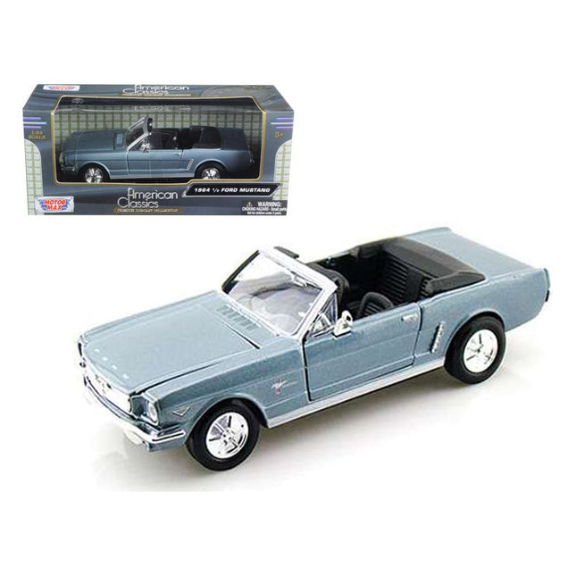 https://cdn.shopify.com/s/files/1/0504/9925/6496/files/1964-12-ford-mustang-convertible-light-blue-124-diecast-model-car-by-motormax-507370.jpg?v=1748418274
