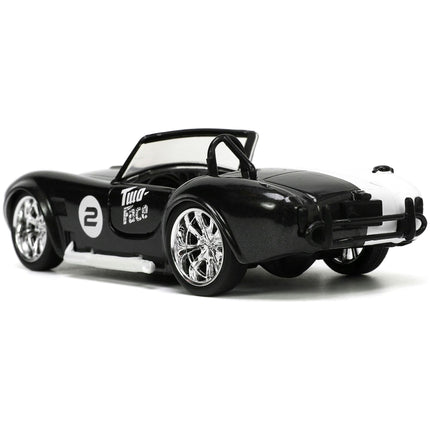 https://cdn.shopify.com/s/files/1/0504/9925/6496/files/1965-shelby-cobra-427-sc-2-black-metallic-and-white-and-harvey-two-face-diecast-figure-batman-hollywood-rides-series-132-diecast-model-car-by-jada-126251.jpg?v=1748419121