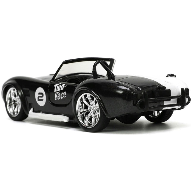 https://cdn.shopify.com/s/files/1/0504/9925/6496/files/1965-shelby-cobra-427-sc-2-black-metallic-and-white-and-harvey-two-face-diecast-figure-batman-hollywood-rides-series-132-diecast-model-car-by-jada-126251.jpg?v=1748419121