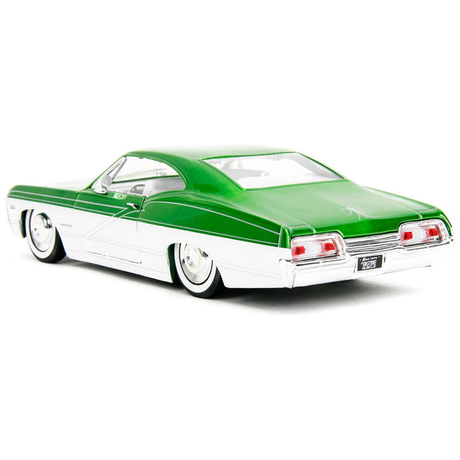 https://cdn.shopify.com/s/files/1/0504/9925/6496/files/1967-chevrolet-impala-ss-green-metallic-and-white-with-white-interior-bigtime-muscle-series-124-diecast-model-car-by-jada-415026.jpg?v=1748419123
