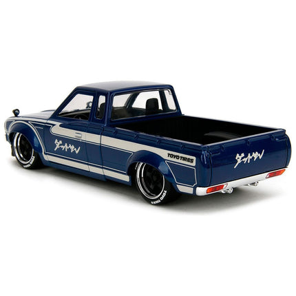 https://cdn.shopify.com/s/files/1/0504/9925/6496/files/1972-datsun-620-pickup-truck-blue-metallic-and-cream-jdm-tuners-series-124-diecast-model-car-by-jada-504526.jpg?v=1748403642