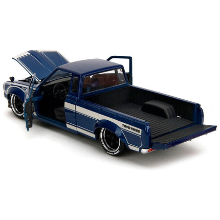 https://cdn.shopify.com/s/files/1/0504/9925/6496/files/1972-datsun-620-pickup-truck-blue-metallic-and-cream-jdm-tuners-series-124-diecast-model-car-by-jada-510889.jpg?v=1748403642