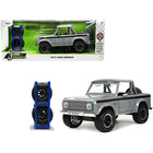 https://cdn.shopify.com/s/files/1/0504/9925/6496/files/1973-ford-bronco-pickup-truck-gray-with-black-stripes-with-extra-wheels-just-trucks-series-124-diecast-model-car-by-jada-835326.jpg?v=1748419223