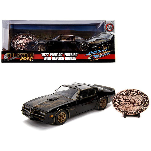 https://cdn.shopify.com/s/files/1/0504/9925/6496/files/1977-pontiac-firebird-trans-am-black-with-replica-buckle-smokey-and-the-bandit-1977-movie-hollywood-rides-series-124-diecast-model-car-by-jada-687393.jpg?v=1748419485