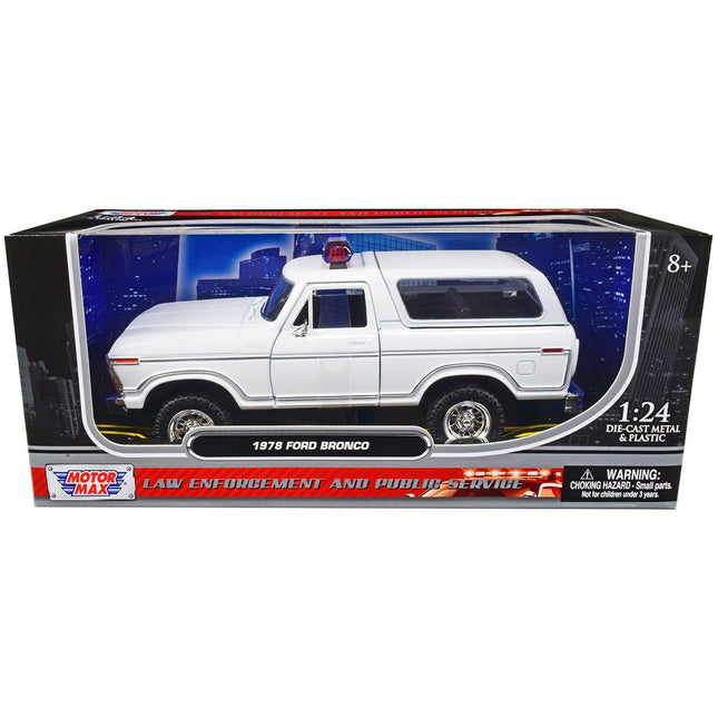 https://cdn.shopify.com/s/files/1/0504/9925/6496/files/1978-ford-bronco-police-car-unmarked-white-law-enforcement-and-public-service-series-124-diecast-model-car-by-motormax-430210.jpg?v=1748418079