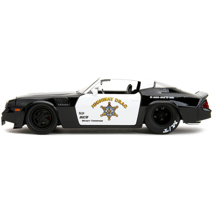 https://cdn.shopify.com/s/files/1/0504/9925/6496/files/1979-chevrolet-camaro-z28-police-black-and-white-highway-drag-bigtime-muscle-series-124-diecast-model-car-by-jada-150769.jpg?v=1748419121