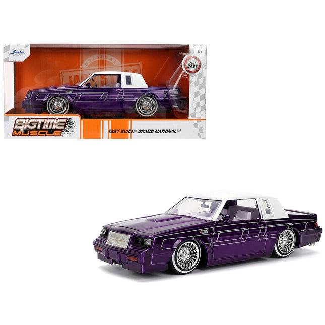 https://cdn.shopify.com/s/files/1/0504/9925/6496/files/1987-buick-grand-national-candy-purple-with-graphics-and-white-top-and-interior-bigtime-muscle-series-124-diecast-model-car-by-jada-192453.jpg?v=1756086815
