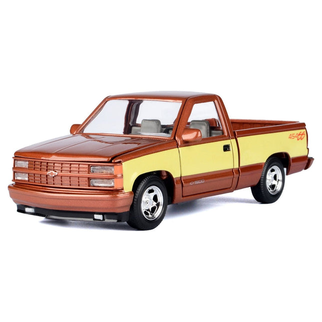 https://cdn.shopify.com/s/files/1/0504/9925/6496/files/1992-chevrolet-454-ss-pickup-truck-copper-metallic-with-beige-sides-american-classics-series-124-diecast-model-car-by-motormax-118259.jpg?v=1748405278