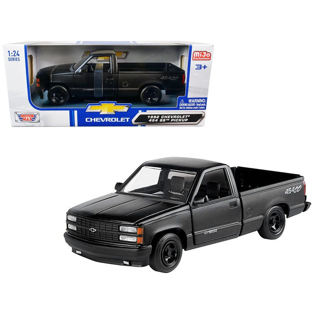 https://cdn.shopify.com/s/files/1/0504/9925/6496/files/1992-chevrolet-454-ss-pickup-truck-matt-black-124-diecast-model-car-by-motormax-881160.jpg?v=1748418018
