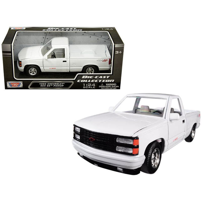 https://cdn.shopify.com/s/files/1/0504/9925/6496/files/1992-chevrolet-454-ss-pickup-truck-white-124-diecast-model-car-by-motormax-405604.jpg?v=1748418016
