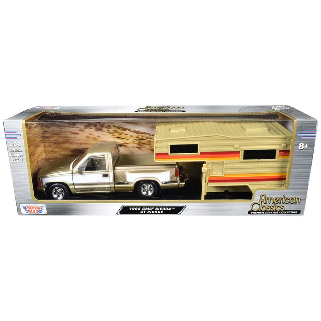 https://cdn.shopify.com/s/files/1/0504/9925/6496/files/1992-gmc-sierra-gt-pickup-truck-gold-metallic-with-white-sides-with-camper-shell-american-classics-series-124-diecast-model-car-by-motormax-907719.jpg?v=1748405359