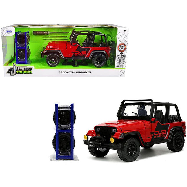 https://cdn.shopify.com/s/files/1/0504/9925/6496/files/1992-jeep-wrangler-dv8-off-road-red-with-matt-black-stripes-with-extra-wheels-just-trucks-series-124-diecast-model-car-by-jada-730587.jpg?v=1748419224