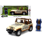 https://cdn.shopify.com/s/files/1/0504/9925/6496/files/1992-jeep-wrangler-tan-and-brown-with-graphics-and-extra-wheels-just-trucks-series-124-diecast-model-car-by-jada-890215.jpg?v=1748419235