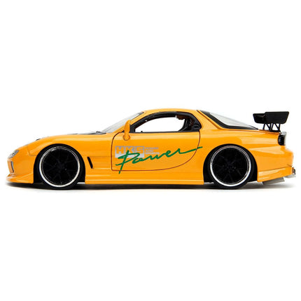https://cdn.shopify.com/s/files/1/0504/9925/6496/files/1993-mazda-rx-7-hks-power-yellow-with-carbon-hood-jdm-tuners-series-124-diecast-model-car-by-jada-242342.jpg?v=1748403975
