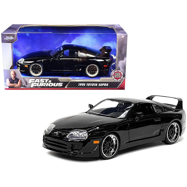 https://cdn.shopify.com/s/files/1/0504/9925/6496/files/1995-toyota-supra-black-fast-furious-movie-124-diecast-model-car-by-jada-236882.jpg?v=1748419221
