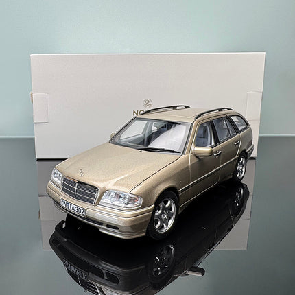 Norev Mercedes-Benz C-Class 1993 Wagon Champagne Silver 1:18 Diecast Model Car - studio product photo of the scale model