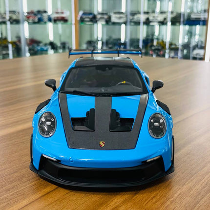 Minichamps 1/18 Porsche 911 GT3 RS 2024 Blue Diecast Model - studio product photo of the scale model