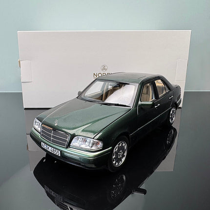 Norev Mercedes-Benz C-Class 1993 Wagon Green 1:18 Diecast Model Car - studio product photo of the scale model