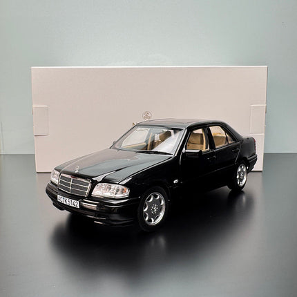 Norev Mercedes-Benz C-Class W205 Black 1:18 Diecast Model Car - studio product photo of the scale model