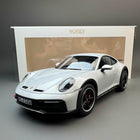 Norev Porsche 911 Dakar 2023 Ice Grey Metallic 1:18 Diecast Model Car - studio product photo of the scale model