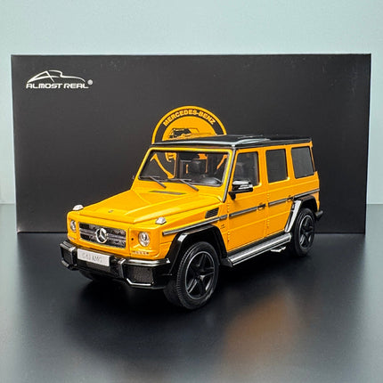 Almost Real Mercedes-Benz G63 AMG 2017 Yellow 1:18 Diecast Model Car - studio product photo of the scale model