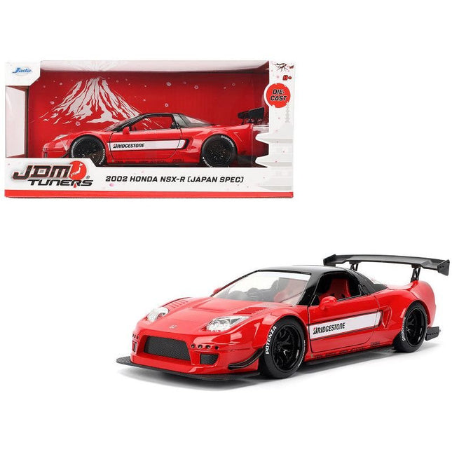 https://cdn.shopify.com/s/files/1/0504/9925/6496/files/2002-honda-nsx-r-rhd-right-hand-drive-bridgestone-red-with-black-top-and-white-stripes-jdm-tuners-series-124-diecast-model-car-by-jada-305632.jpg?v=1748403656