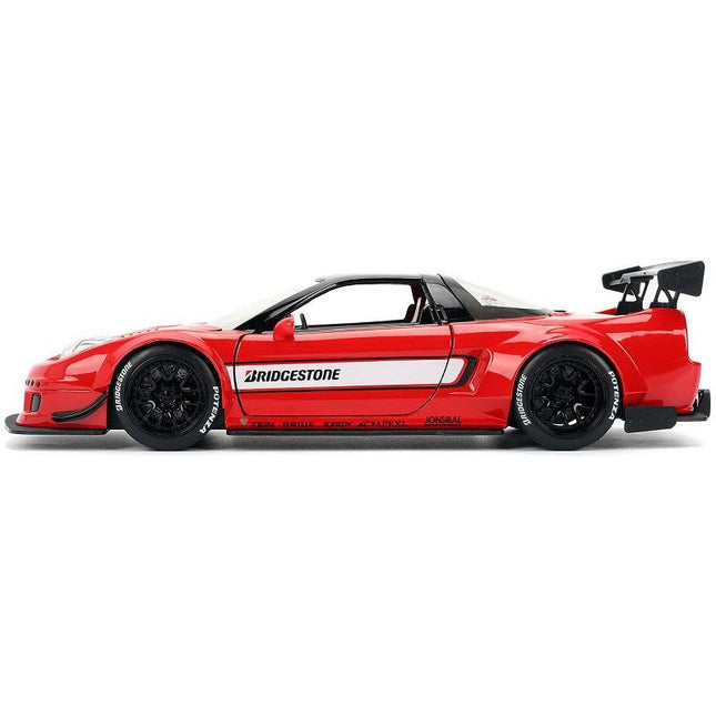 https://cdn.shopify.com/s/files/1/0504/9925/6496/files/2002-honda-nsx-r-rhd-right-hand-drive-bridgestone-red-with-black-top-and-white-stripes-jdm-tuners-series-124-diecast-model-car-by-jada-390683.jpg?v=1748403656