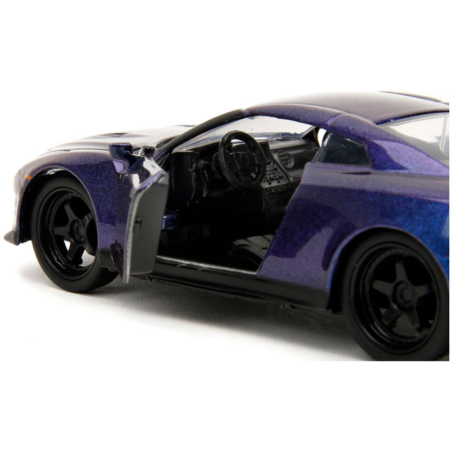 https://cdn.shopify.com/s/files/1/0504/9925/6496/files/2009-nissan-gt-r-r35-purple-metallic-pink-slips-series-132-diecast-model-car-by-jada-505026.jpg?v=1748419123