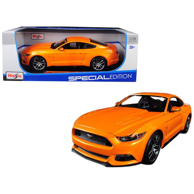 https://cdn.shopify.com/s/files/1/0504/9925/6496/files/2015-ford-mustang-gt-50-orange-metallic-special-edition-118-diecast-model-car-by-maisto-315150.jpg?v=1748418494