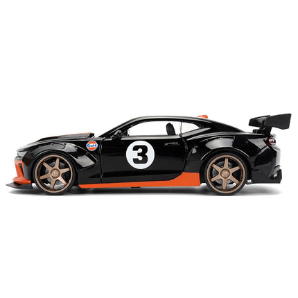 https://cdn.shopify.com/s/files/1/0504/9925/6496/files/2016-chevrolet-camaro-3-gulf-oil-black-with-orange-stripe-wide-body-series-124-diecast-model-car-by-jada-329050.jpg?v=1756086815