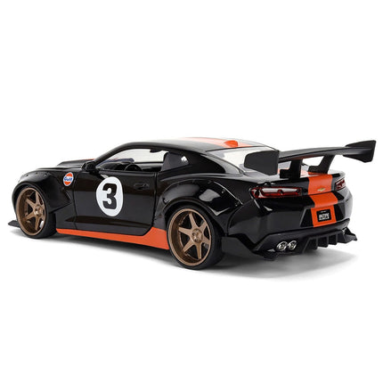 https://cdn.shopify.com/s/files/1/0504/9925/6496/files/2016-chevrolet-camaro-3-gulf-oil-black-with-orange-stripe-wide-body-series-124-diecast-model-car-by-jada-422574.jpg?v=1756086814