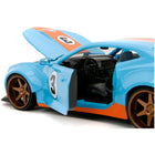 https://cdn.shopify.com/s/files/1/0504/9925/6496/files/2016-chevrolet-camaro-widebody-3-light-blue-with-orange-stripes-gulf-oil-wide-body-series-124-diecast-model-car-by-jada-911088.jpg?v=1748419007